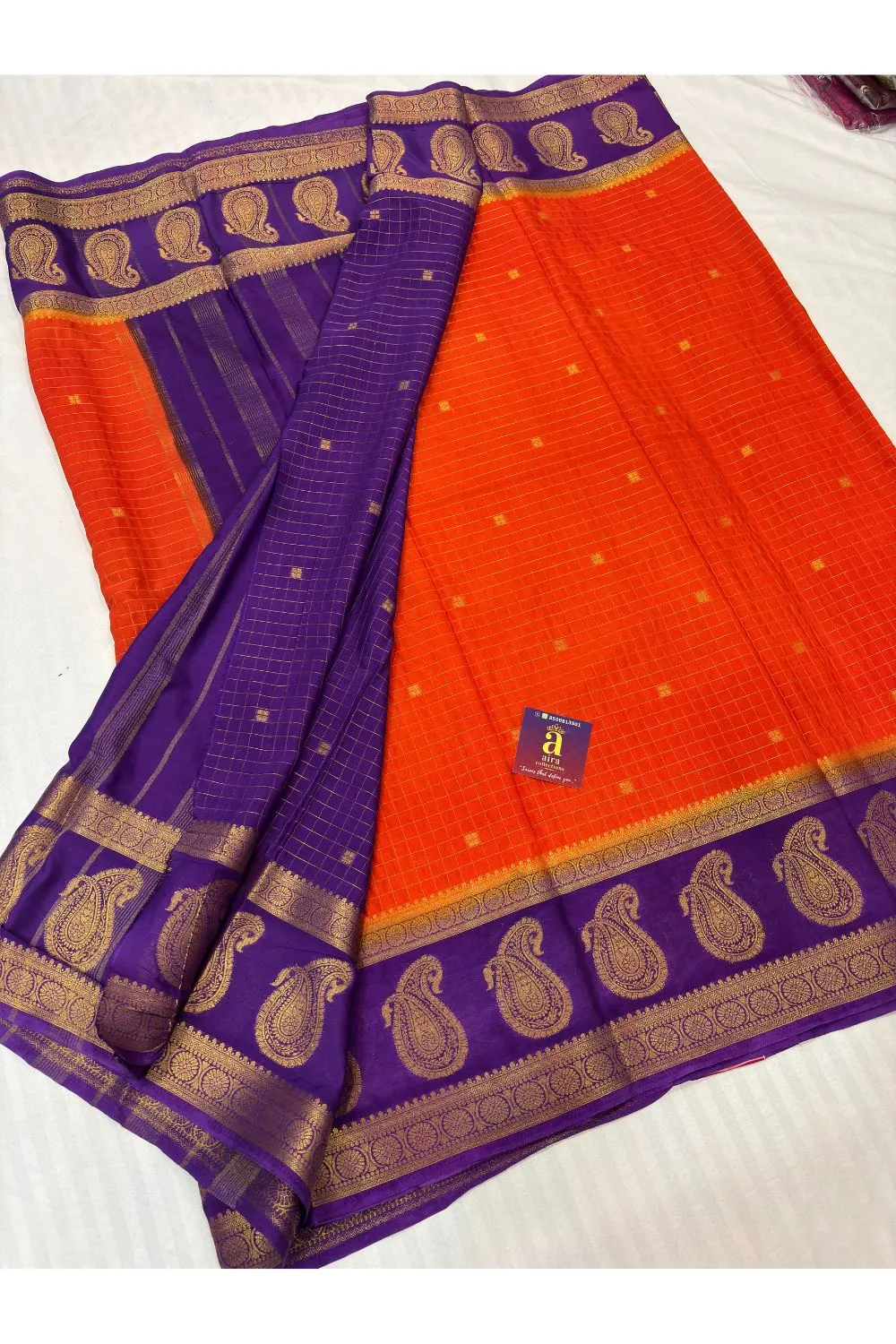 Deep Orange Banaras Georgette Saree with royal purple paisley zari border and vintage checks weaving