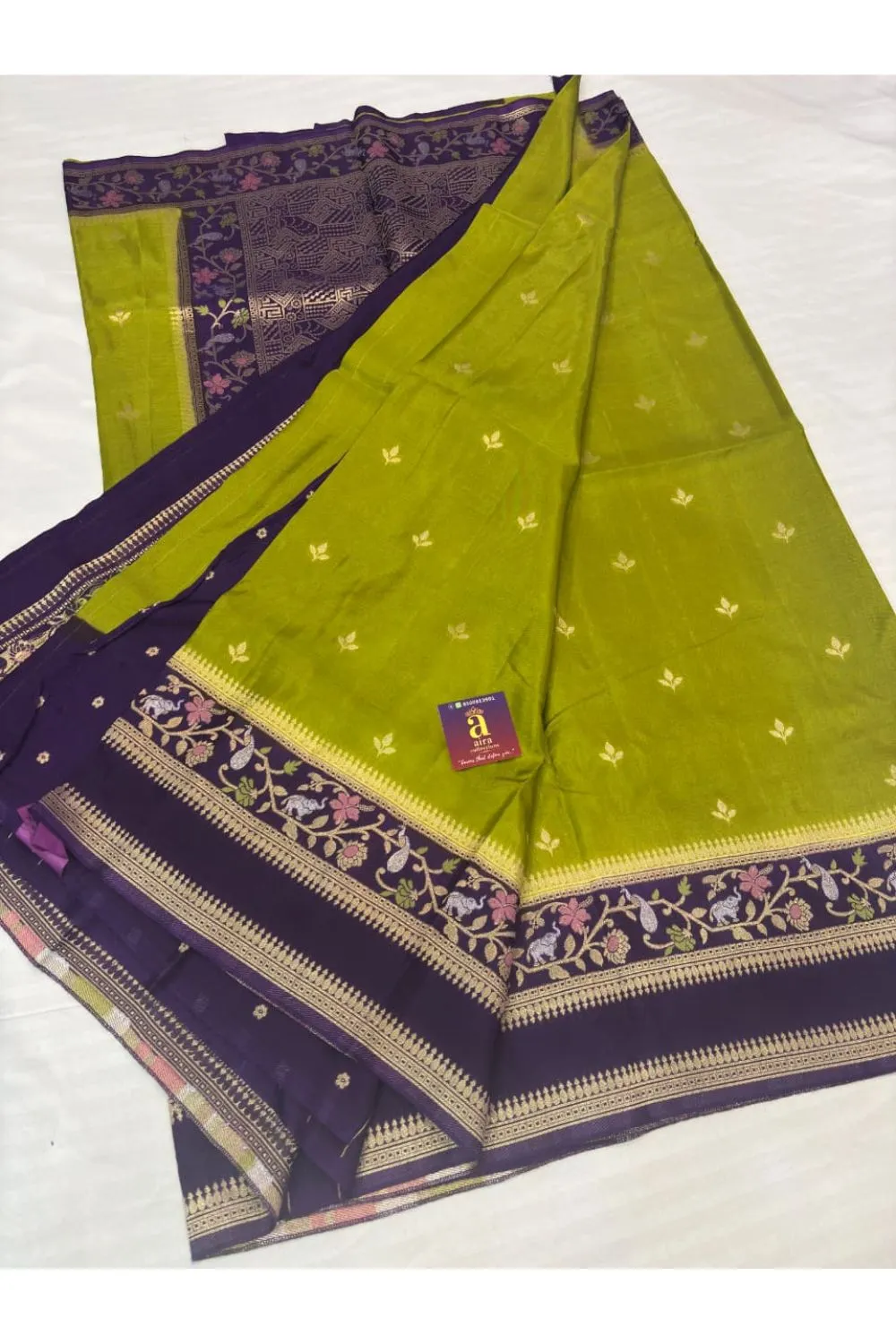 Olive Green Banaras Fancy Saree with purple floral zari border and gold butta weaving