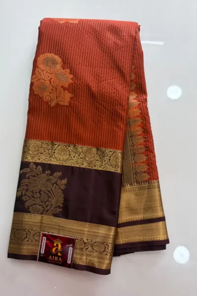 Rust Orange Semi Pattu Saree with gold stripes, floral motifs and wine zari border