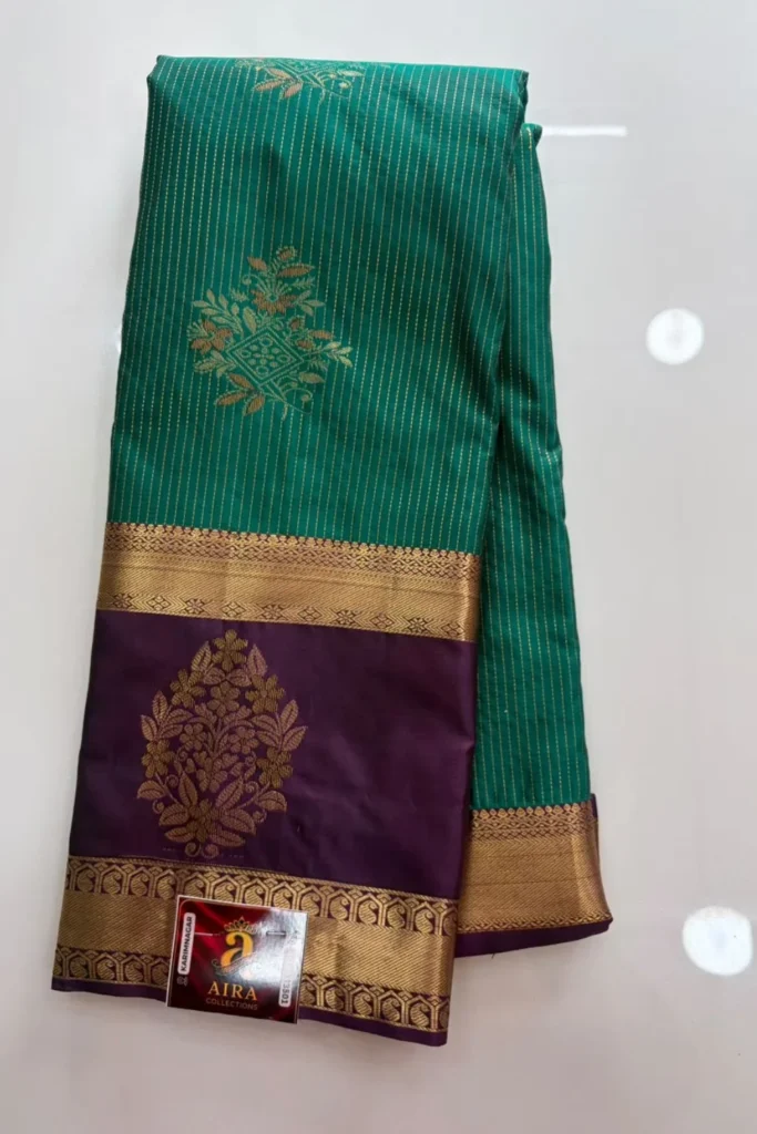 Teal Green Semi Pattu Saree with Gold Stripes & Purple Floral Pallu